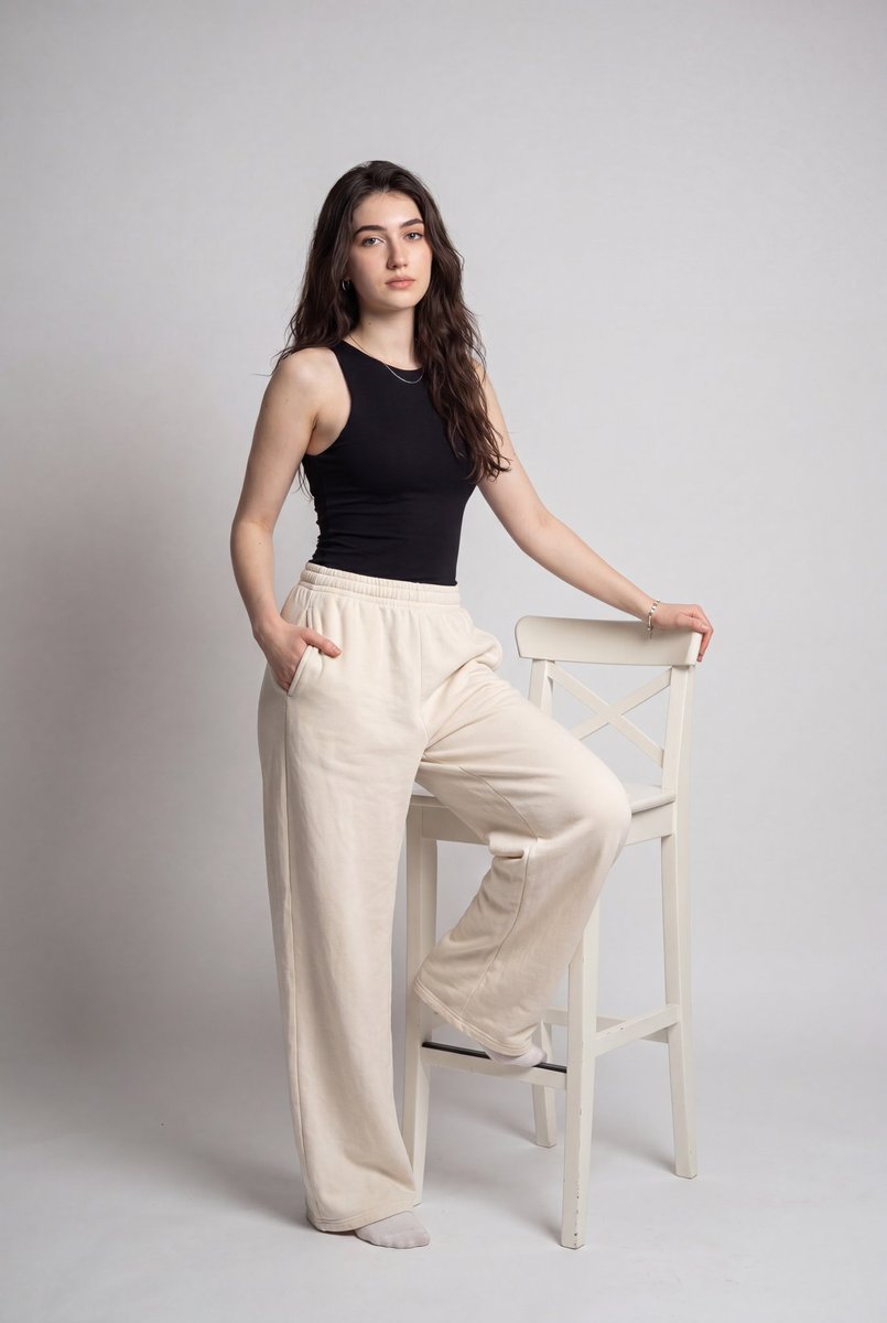 person, feminine, standing_with_one_leg_raised_and_resting_on_chair, sli...