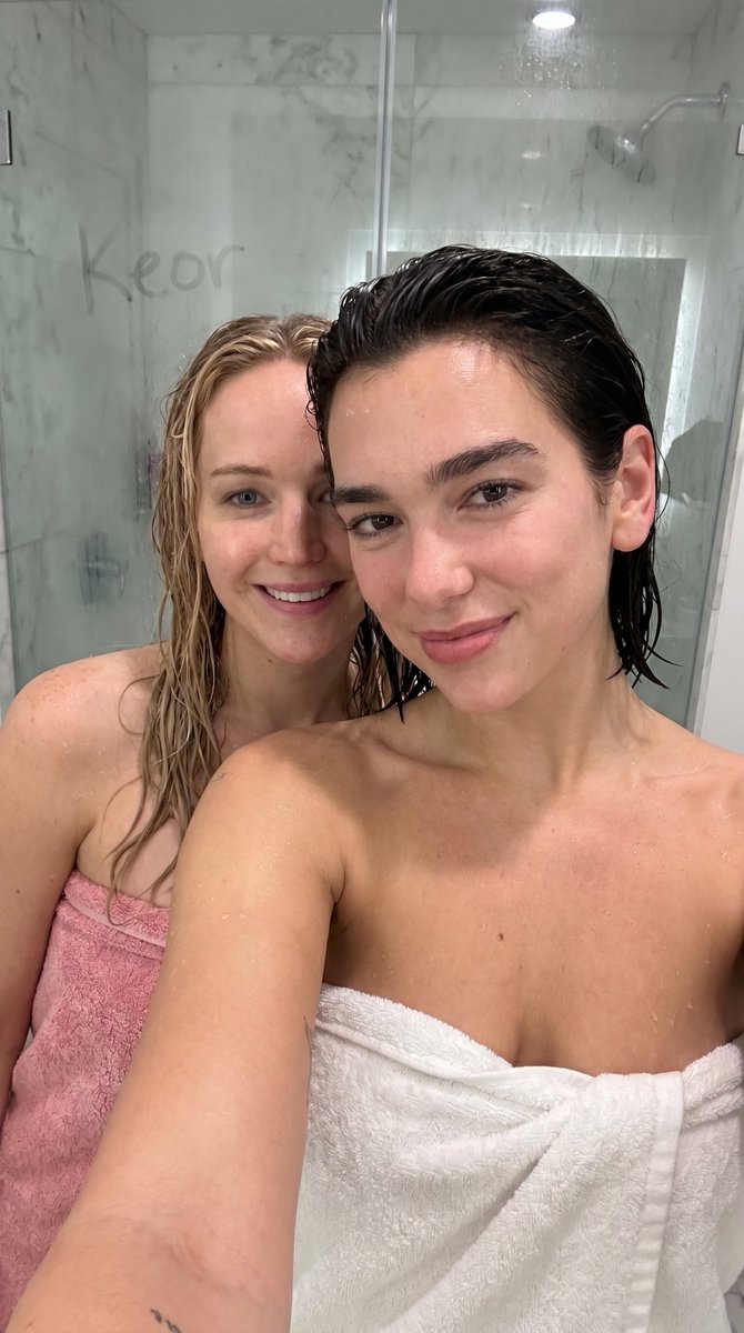 { "subject": { "main": { "identity": "Dua Lipa", "likeness_calibration": "brunette", "facial_fea...